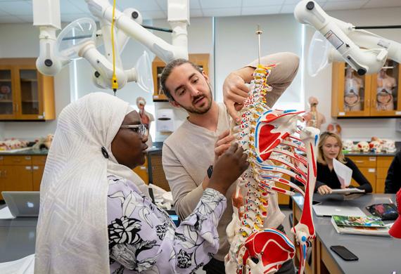 Image of students learning in a biology lab.