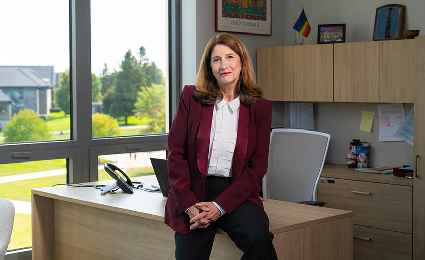 Dean Gatins in her new Dyson office. Photo by Carlo de Jesus/Marist College. 