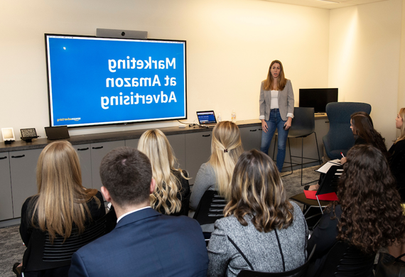 An image of students at a presentation on annual New York City Career Trek