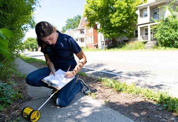 Image of student Megan Nickel completing field work during an internship.