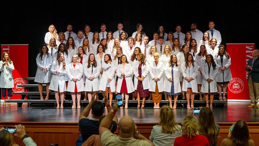 Image of The PA Program class receives cheers from the Nelly Golleti Theater audience. Photo by Carlo de Jesus/Marist College