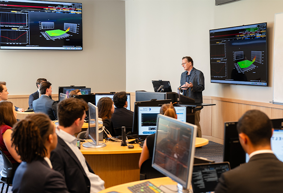 Photo of students and faculty in the Investment Center