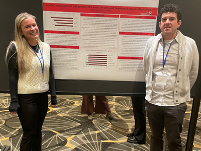 Image of student and faculty member presenting research at the Eastern Psychological Association.